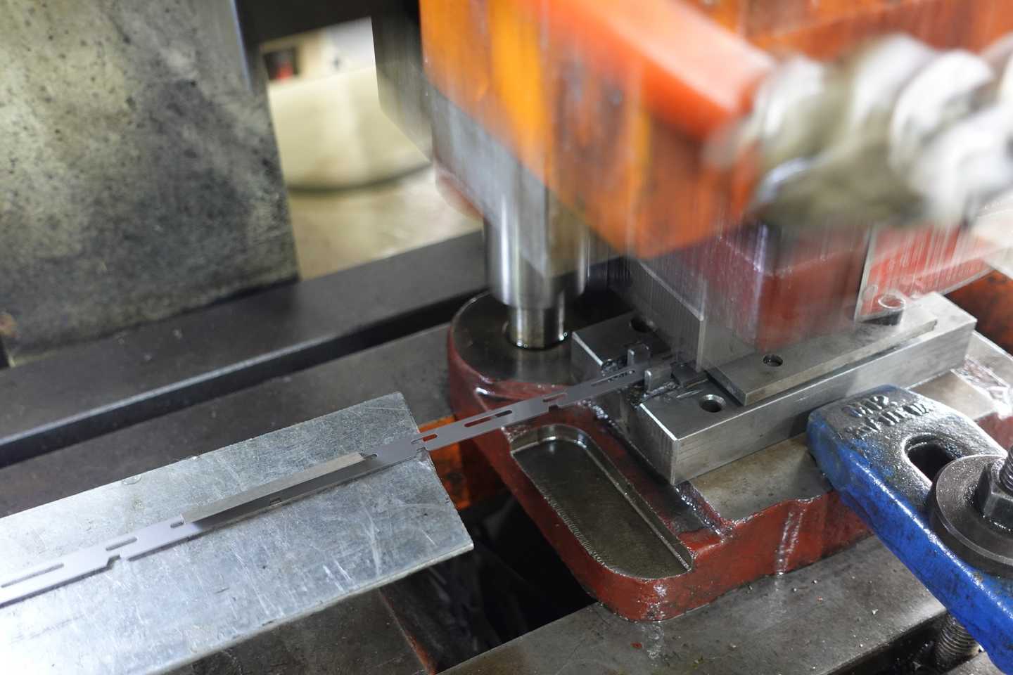 Trimmer blade press processing