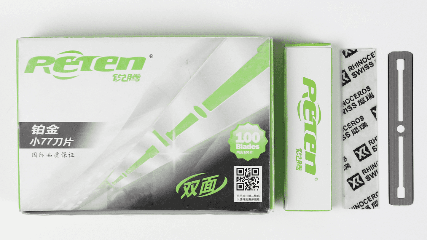 small straight razor blade in green box